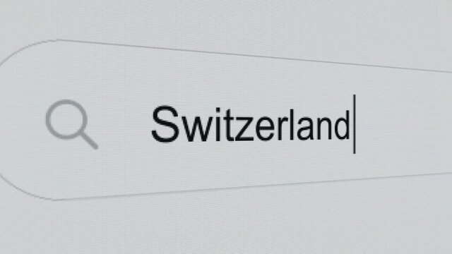 Switzerland - Internet browser search engine bar typing Alpine Country name.