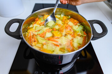 Cooking Bright Vegetable Soup on the Stove