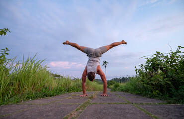 Man practice Yoga practice and meditation outdoor