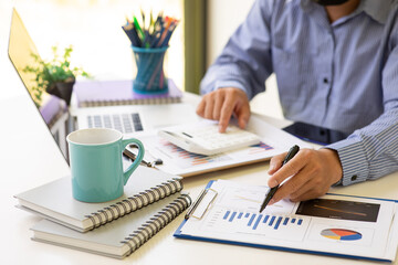 Businessman hands hold documents with financial statistic stock photo,discussion and report...