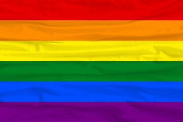 LGBT pride flag lesbian, gay, bisexual, transgender. Rainbow flag. Fabric folds. Gay and lesbian love.