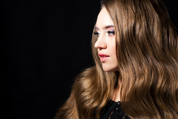 Fototapeta premium An attractive blonde with a Hollywood wave styling,