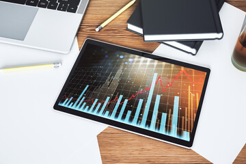 Modern digital tablet monitor with abstract creative financial chart, research and analytics concept. Top view. 3D Rendering