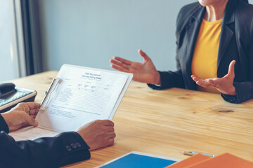 Job Interview HR human resource manager interviewing new employee candidate look at CV Resume...