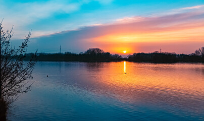 Beautiful sunset with reflections near Plattling, Isar, Bavaria, Germany