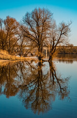 Beautiful sunny winter view with reflections near the famous Bogenberg, Danube, Bavaria, Germany