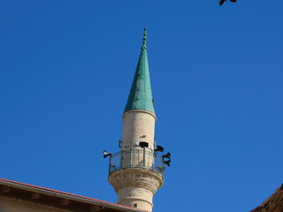 Nice view of the minaret against the blue sky in Acre, Israel.