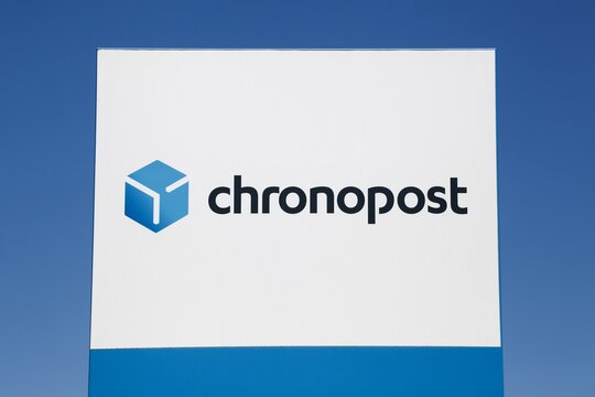 Lissieu, France - July 4, 2020: Chronopost logo on a signboard. Chronopost is a member of the La Poste group, provides express shipping and delivery service both in France and internationally