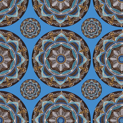 Seamless pattern with colorful abstract circles on blue background.