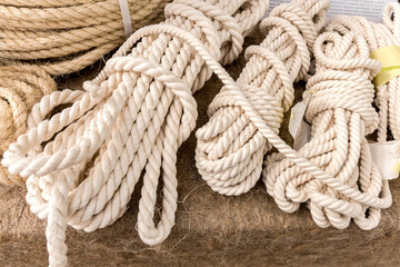 Twisted skeins of white cotton rope. Close up.