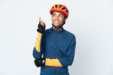 Young cyclist Brazilian man isolated on white background pointing up a great idea - obrazy, fototapety, plakaty