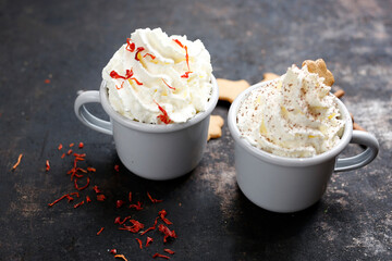 Hot chocolate with whipped cream.  A warming sweet dessert. Culinary photography.