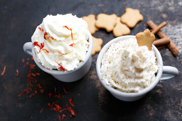 Hot chocolate with whipped cream.  A warming sweet dessert. Culinary photography.
