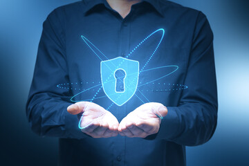 Cyber security and protection concept with digital lock symbol over open man palms.