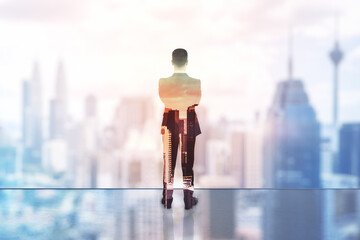 Businessman standing and thinking with city panorama in the background, decision and entrepreneurship concept. Double exposure