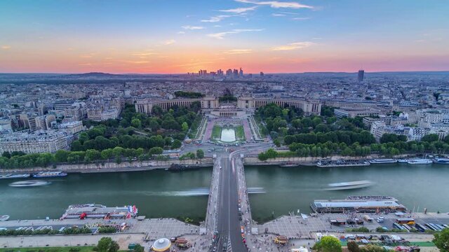 Sunset over Trocadero timelapse with the Palais de Chaillot seen from the Eiffel Tower in Paris, France.