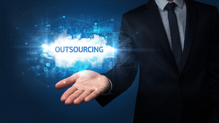 Hand of Businessman holding motivational message