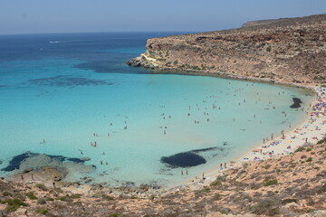 Transparent and blue water in the sea of Lampedusa at the Rabbits beach. The Pelagie Islands are the southernmost point of Italy in Sicily.