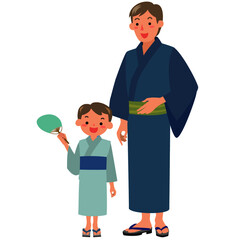 浴衣を着た男の子と父親