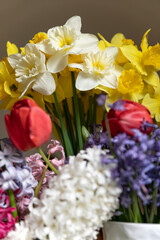 Naklejka na ściany i meble Close-up of a bouqet of flowers. Colored flowers. Selective focus, macro image.
