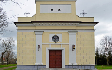 Close-up photos of the architectural details and the belfry of the Catholic Church of Saint...