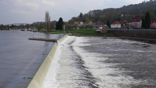 A beautiful shot of flowing water of Weser River in Hameln, Germany in HD