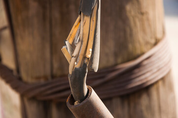 Broken old white ground electric cord. Dangerous damage power electrical cable that can make...
