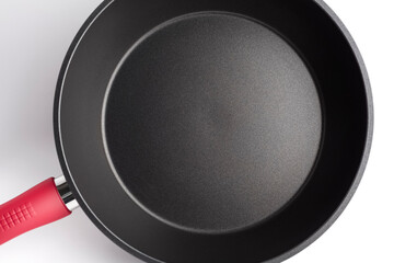 Frying pan close-up on a white background. detail close-up