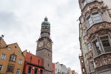 Old Town Hall called Altes Rathaus in Innsbruck, Tyrol, Austria, with the Gothic Tower called...