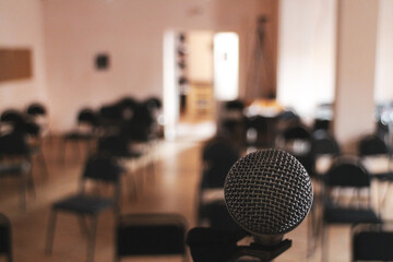microphone on stage empty hall first person view performance speech fear public