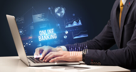 Businessman working on laptop, business concept