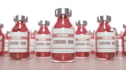 Coronavirus vaccine in ampoules on a laboratory table red background. 3d rendering