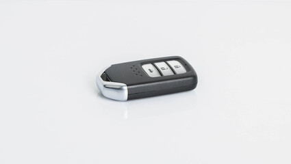 New car wave key with remote control on white background, isolated.