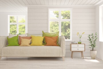 Fototapeta premium White living room with sofa and summer landscape in window. Scandinavian interior design. 3D illustration