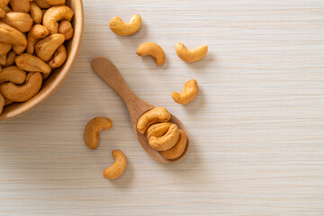 Cashew nuts in wooden bowl