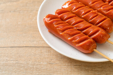 fried sausage skewer on plate