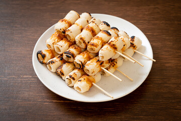 grilled tube shaped fish paste cake skewe or tube squid skewer
