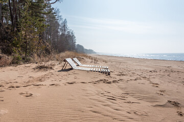 Two Lounge Chairs on an Empty Beach on the Baltic Sea