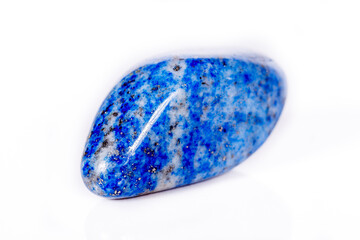 Macro mineral stone blue lapis lazuli (afghanistan) on white background