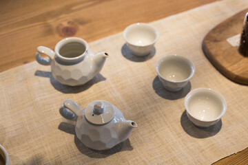 Obraz na płótnie Canvas Asian food background with a tea set, cups, and teapot.
