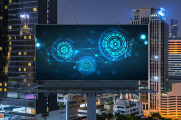 Information flow hologram on road billboard, night panorama city view of Bangkok. The largest technological center in Southeast Asia. The concept of programming science.