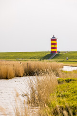 Der Pilsumer Leuchtturm in Greetsiel, Krummhorn, Niedersachsen, Deutschland