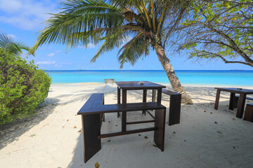 dining tables on a tropical island