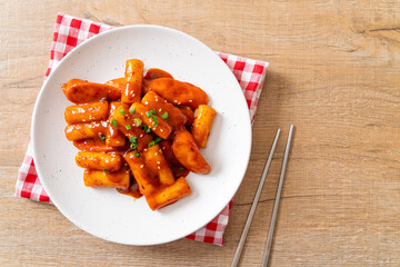 Korean rice cake stick with sausage in spicy sauce - Tteokbokki