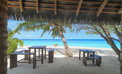 dining tables on a tropical island