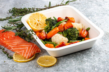 Blanched vegetables in lemon dressing. Diet and healthy food  in eco containers. Takeaway.