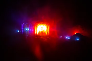 Poster Police car blue and red round vintage siren in dark. Rotating retro style police siren in dark. © zef art