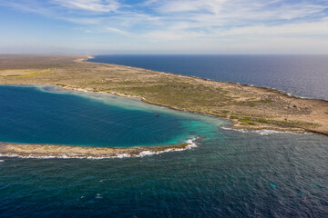 Fototapeta na wymiar Aerial view above scenery of Curacao, Caribbean with ocean, coast and beach