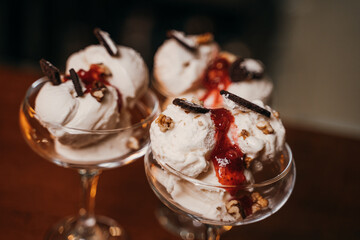 balls of ice cream in a beautiful glass dish