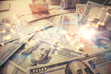 Multi exposure of forex chart drawing over us dollars bill background. Concept of financial success markets.
